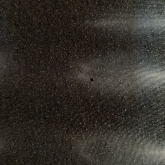 Billabong tie dye with pinhole in middle of shirt - Picture 2 of 2